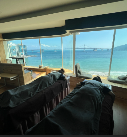 Two treatment beds overlooking Gwangalli Beach